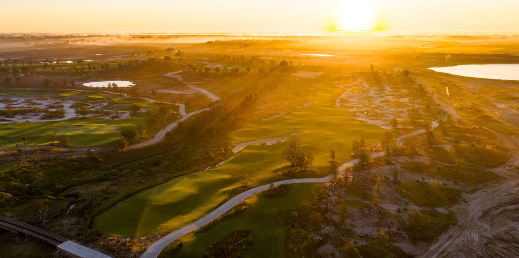 aerial view of golf club at sunset